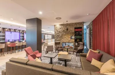 Ein Sitzbereich in der Unterkunft Hilton Garden Inn Munich City West