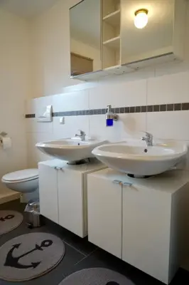 Ein Badezimmer in der Unterkunft M&A Ferienwohnungen Oberbayern