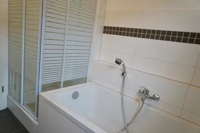 Ein Badezimmer in der Unterkunft M&A Ferienwohnungen Oberbayern