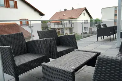 Ein Sitzbereich in der Unterkunft M&A Ferienwohnungen Oberbayern