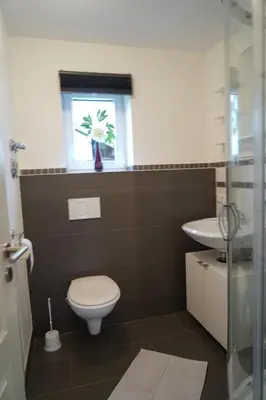 Ein Badezimmer in der Unterkunft M&A Ferienwohnungen Oberbayern