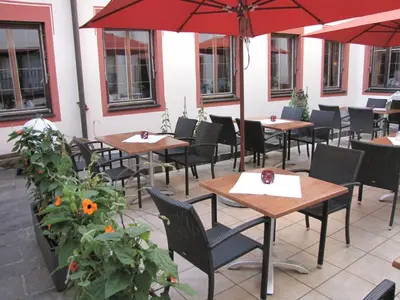 Ein Restaurant oder anderes Speiselokal in der Unterkunft Bayerischer Hof