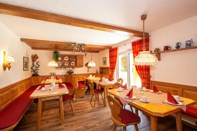 Ein Restaurant oder anderes Speiselokal in der Unterkunft Boutique Hotel Angerer