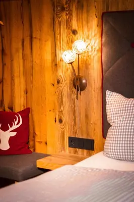 Ein Bett oder Betten in einem Zimmer der Unterkunft Berggasthof Obere Firstalm