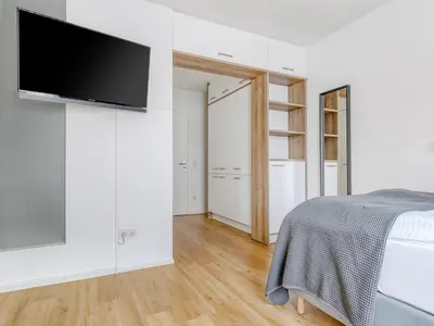 Ein Bett oder Betten in einem Zimmer der Unterkunft Limehome Augsburg Am Katzenstadel