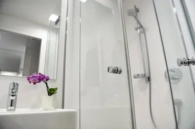 Ein Badezimmer in der Unterkunft Hotel am alten Park
