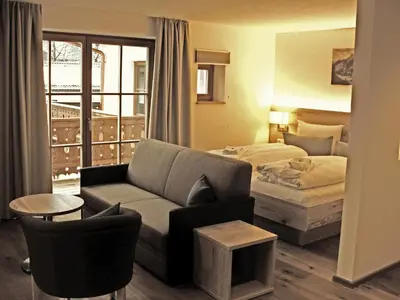 Ein Bett oder Betten in einem Zimmer der Unterkunft Mammhofer Suite & Breakfast