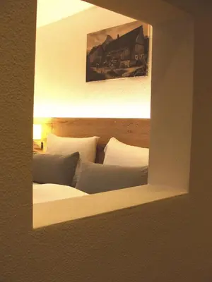 Ein Bett oder Betten in einem Zimmer der Unterkunft Mammhofer Suite & Breakfast