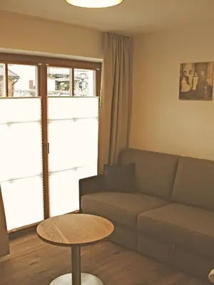 Ein Sitzbereich in der Unterkunft Mammhofer Suite & Breakfast