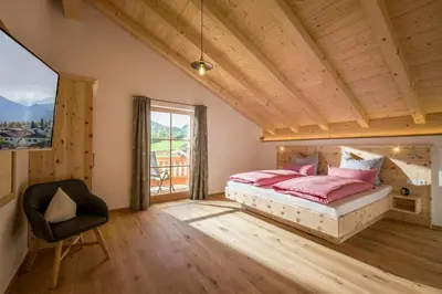 Ein Bett oder Betten in einem Zimmer der Unterkunft Lainthalerhof
