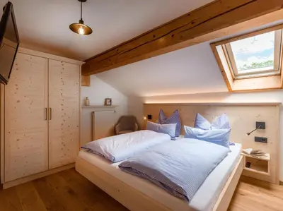 Ein Bett oder Betten in einem Zimmer der Unterkunft Lainthalerhof