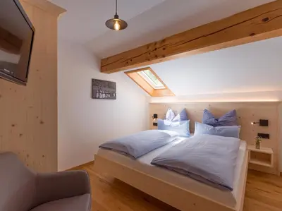 Ein Bett oder Betten in einem Zimmer der Unterkunft Lainthalerhof