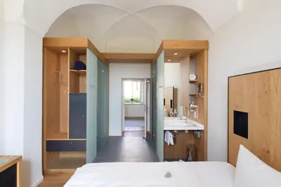 Ein Bett oder Betten in einem Zimmer der Unterkunft Hotel Kloster Holzen