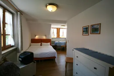 Ein Bett oder Betten in einem Zimmer der Unterkunft Hotel-Gasthof Rose
