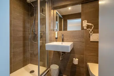 Ein Badezimmer in der Unterkunft Hotel Weißbräu