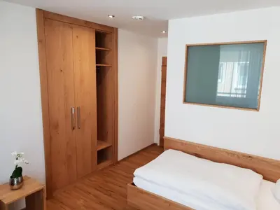 Ein Bett oder Betten in einem Zimmer der Unterkunft Kurhotel Roswitha