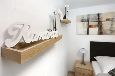 Ein Bett oder Betten in einem Zimmer der Unterkunft Ferienwohnung am Regierungsplatz