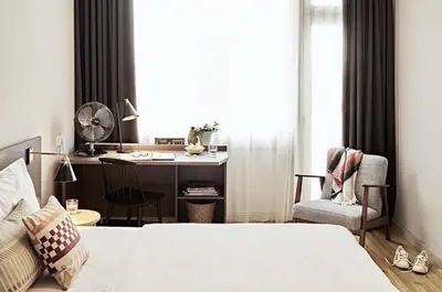 Ein Bett oder Betten in einem Zimmer der Unterkunft Bold Hotel München Zentrum