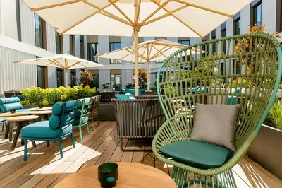 Ein Sitzbereich in der Unterkunft Motel One München-Messe