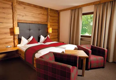 Ein Bett oder Betten in einem Zimmer der Unterkunft Landgasthof Schmuck