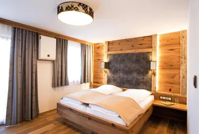 Ein Bett oder Betten in einem Zimmer der Unterkunft Landgasthof Schmuck