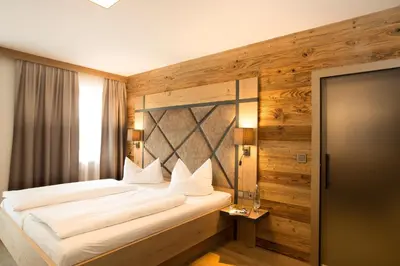 Ein Bett oder Betten in einem Zimmer der Unterkunft Landgasthof Schmuck