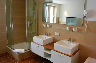 Ein Badezimmer in der Unterkunft Hotel Schlee