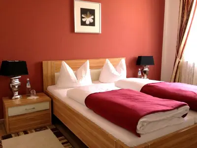 Ein Bett oder Betten in einem Zimmer der Unterkunft Hotel Schlee