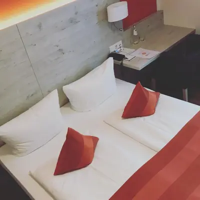 Ein Bett oder Betten in einem Zimmer der Unterkunft Hotel Schlee