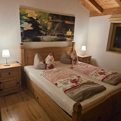 Ein Bett oder Betten in einem Zimmer der Unterkunft Ferienhaus Beyer
