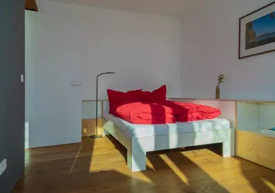 Ein Bett oder Betten in einem Zimmer der Unterkunft Zeitraumferien