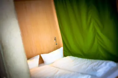 Ein Bett oder Betten in einem Zimmer der Unterkunft Zeitraumferien
