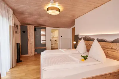 Ein Bett oder Betten in einem Zimmer der Unterkunft Landgasthof Zum Sägwirt