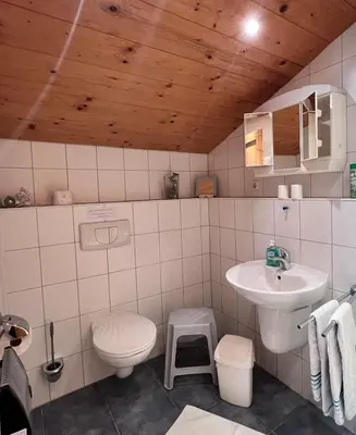 Ein Badezimmer in der Unterkunft Haus Chiemseeblick
