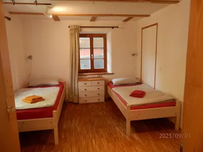 Ein Bett oder Betten in einem Zimmer der Unterkunft Prälatenstraße 10