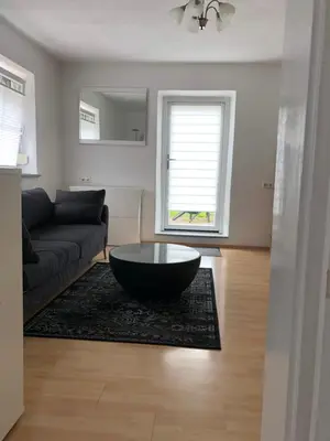 Ein Sitzbereich in der Unterkunft Kosumi Apartment