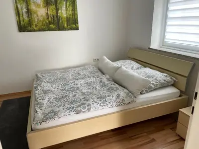 Ein Bett oder Betten in einem Zimmer der Unterkunft Kosumi Apartment