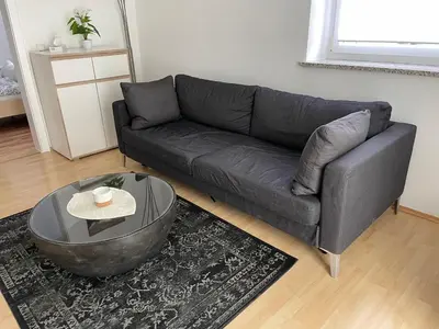 Ein Sitzbereich in der Unterkunft Kosumi Apartment