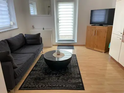 Ein Sitzbereich in der Unterkunft Kosumi Apartment
