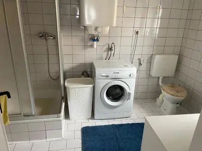 Ein Badezimmer in der Unterkunft Kosumi Apartment