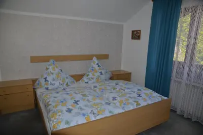 Ein Bett oder Betten in einem Zimmer der Unterkunft Ferienwohnung Steinhauser