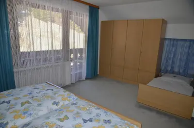 Ein Bett oder Betten in einem Zimmer der Unterkunft Ferienwohnung Steinhauser