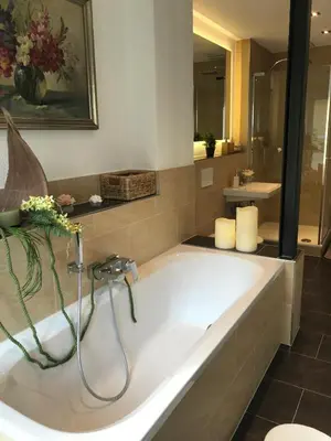 Ein Sitzbereich in der Unterkunft Golden GaPa Central Large Family Apartment 24