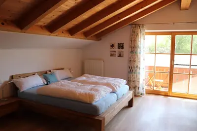 Ein Bett oder Betten in einem Zimmer der Unterkunft Ferienwohnung Pferdehof Pankratz