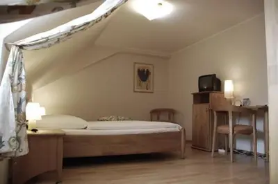 Ein Bett oder Betten in einem Zimmer der Unterkunft Gasthaus Ochsenwirt