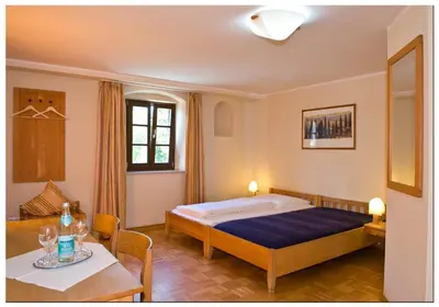 Ein Bett oder Betten in einem Zimmer der Unterkunft Gasthaus Ochsenwirt
