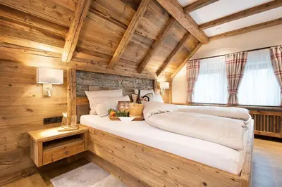 Ein Bett oder Betten in einem Zimmer der Unterkunft Wellness-Hotel ADLER
