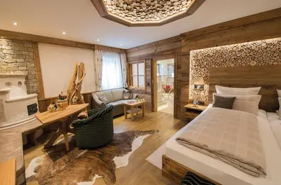 Ein Bett oder Betten in einem Zimmer der Unterkunft Wellness-Hotel ADLER