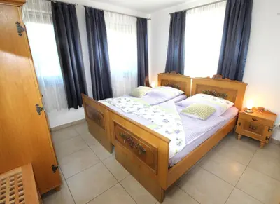 Ein Bett oder Betten in einem Zimmer der Unterkunft Gästehaus Dürnberg