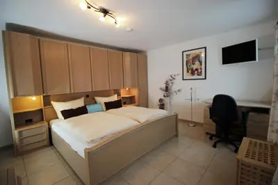 Ein Bett oder Betten in einem Zimmer der Unterkunft Gästehaus Dürnberg